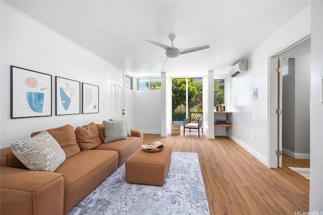 7421 Mokuhano Pl, Honolulu, HI 96825 - living area featuring ceiling fan, light wood-style flooring, and a wall mounted AC