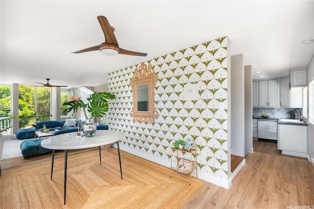 7421 Mokuhano Pl, Honolulu, HI 96825 - dining room featuring a ceiling fan, light wood-style flooring, and wallpapered walls