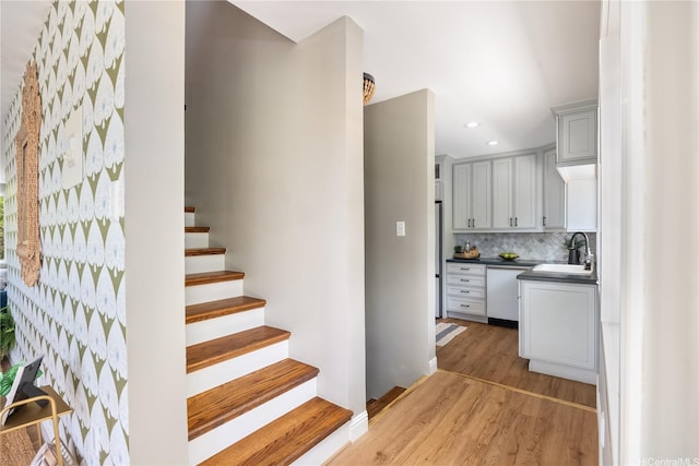 7421 Mokuhano Pl, Honolulu, HI 96825 - staircase with wood finished floors and recessed lighting
