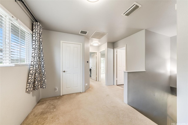 91-1200 Keaunui Dr Unit 204, Ewa Beach, HI 96706 - corridor featuring light colored carpet and healthy amount of natural light