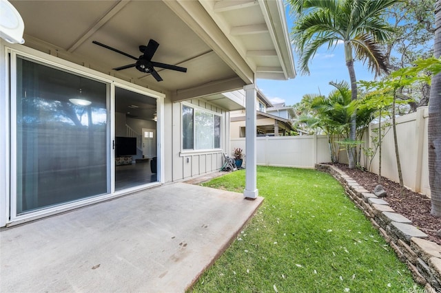 91-1200 Keaunui Dr Unit 204, Ewa Beach, HI 96706 - fenced backyard with a ceiling fan and a patio area