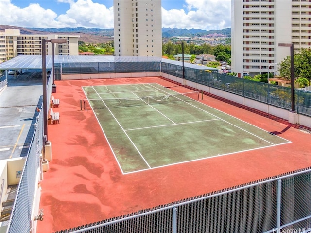 990 Ala Nanala St Unit 27D, Honolulu, HI 96818 - view of tennis court with a mountain view