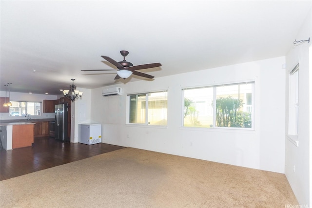 724 Kakala St Unit 1801, Ewa Beach, HI 96706 - unfurnished living room featuring a wall mounted AC, dark carpet, a chandelier, a sink, and ceiling fan
