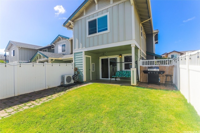 724 Kakala St Unit 1801, Ewa Beach, HI 96706 - rear view of property featuring board and batten siding, a patio area, and a cooling unit