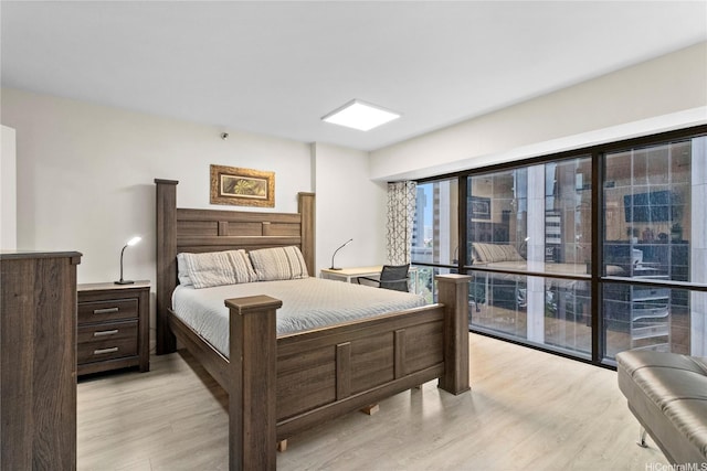 1088 Bishop St Unit 1008, Honolulu, HI 96813 - bedroom with light wood finished floors