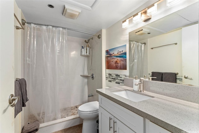 1088 Bishop St Unit 1008, Honolulu, HI 96813 - bathroom featuring vanity, toilet, a shower with curtain, and tile patterned floors