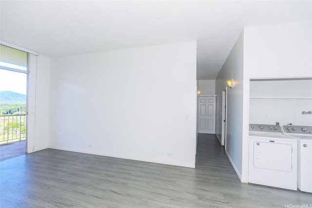 1830 Wilikina Dr Unit 1006, Wahiawa, HI 96786 - unfurnished living room featuring washing machine and dryer, wood finished floors, and baseboards