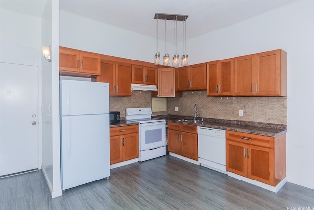 1830 Wilikina Dr Unit 1006, Wahiawa, HI 96786 - kitchen with white appliances, under cabinet range hood, a sink, dark wood-style floors, and brown cabinets
