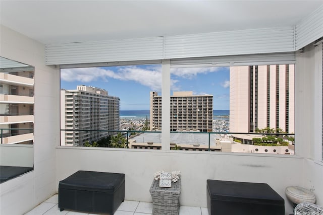 1720 Ala Moana Blvd Unit 1501B, Honolulu, HI 96815 - sunroom / solarium featuring a water view and a view of city