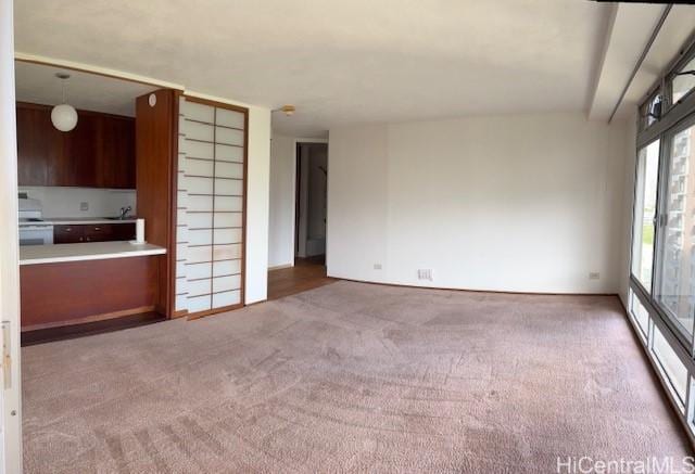 1519 Nuuanu Ave Unit 1042, Honolulu, HI 96817 - unfurnished living room featuring carpet flooring