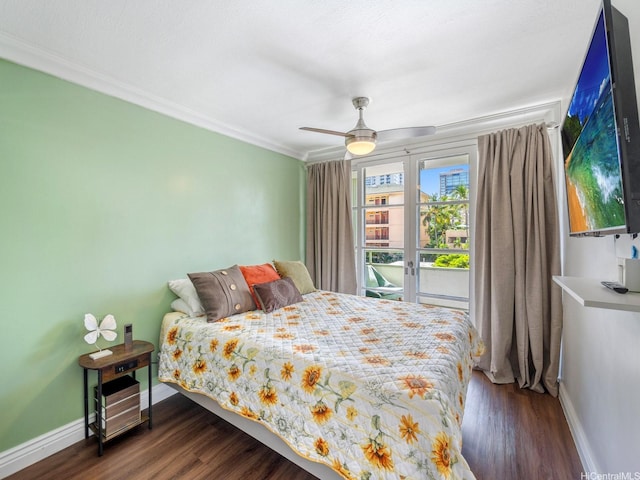445 Kaiolu St Unit 409, Honolulu, HI 96815 - bedroom featuring baseboards, wood finished floors, crown molding, access to exterior, and ceiling fan