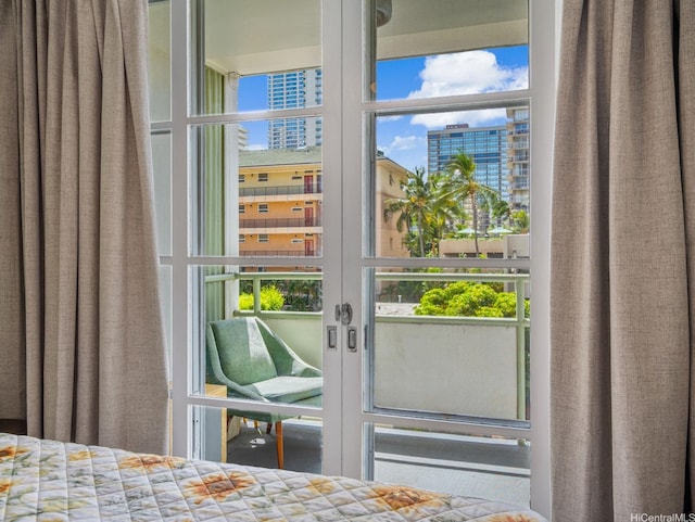 445 Kaiolu St Unit 409, Honolulu, HI 96815 - bedroom featuring multiple windows