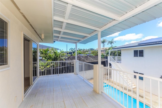 736 Ulili St, Honolulu, HI 96816 - wooden deck with stairway and an outdoor pool