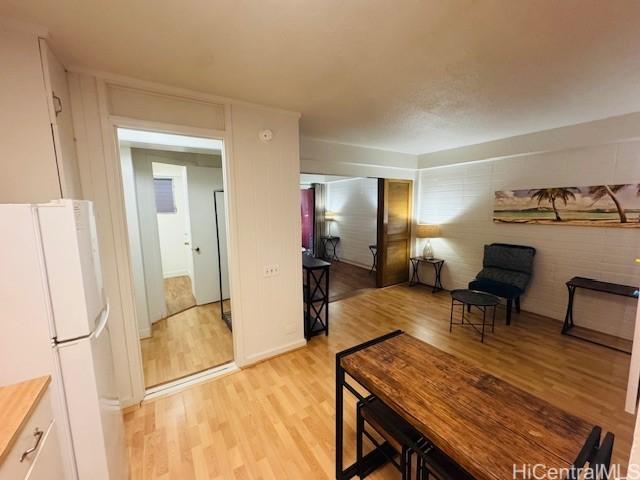 417 Nohonani St Unit 311, Honolulu, HI 96815 - dining room with light wood finished floors