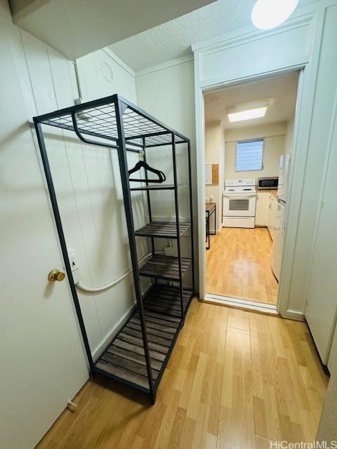 417 Nohonani St Unit 311, Honolulu, HI 96815 - hallway featuring light wood finished floors