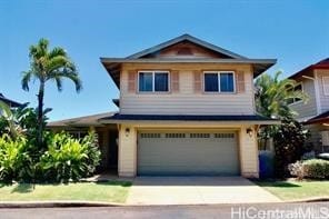 92-831 Makakilo Dr Unit 61, Kapolei, HI 96707 - view of front of home with a garage and concrete driveway