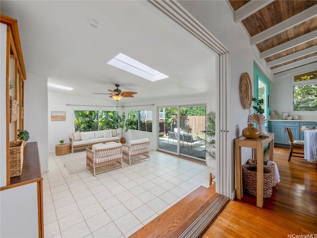 45-141A Kokokahi Pl, Kaneohe, HI 96744 - living area with a skylight, ceiling fan, and light tile patterned floors