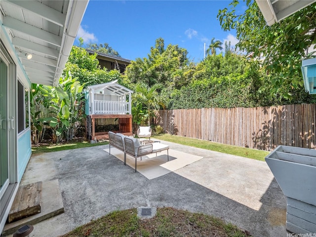 45-141A Kokokahi Pl, Kaneohe, HI 96744 - fenced backyard featuring a patio and an outdoor hangout area