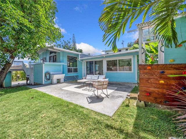 45-141A Kokokahi Pl, Kaneohe, HI 96744 - rear view of property with a patio area, a yard, and an outdoor living space
