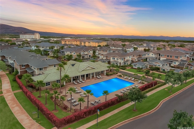 550 Kunehi St Unit 202, Kapolei, HI 96707 - aerial view at dusk of view of pool, a residential view, and a mountain view