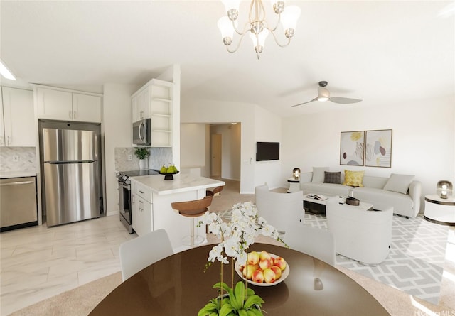 91-945 Laaulu St Unit 44B, Ewa Beach, HI 96706 - dining space with a chandelier and ceiling fan