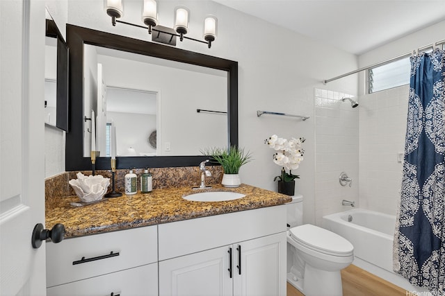 7528 Olili Pl, Honolulu, HI 96825 - bathroom with vanity, shower / bathtub combination with curtain, and wood finished floors