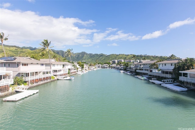 477 Opihikao Place -, Honolulu, HI 96825 - water view featuring nearby suburban area, a floating dock, and mountains