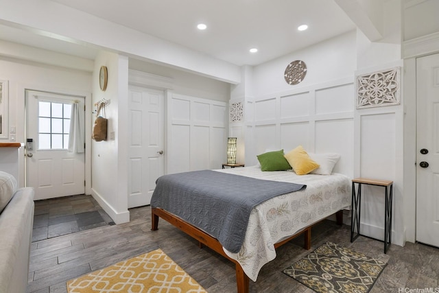 54-298 Hauula Homestead Rd Unit A, Hauula, HI 96717 - bedroom featuring a decorative wall, recessed lighting, and wood finished floors