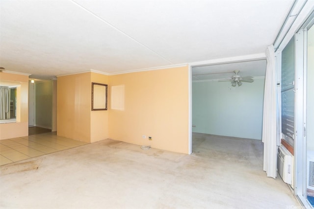 1717 Ala Wai Blvd Unit 303, Honolulu, HI 96815 - carpeted empty room featuring a ceiling fan and ornamental molding