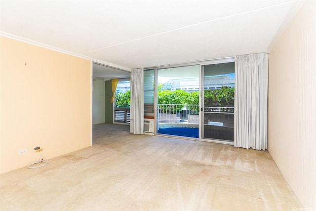 1717 Ala Wai Blvd Unit 303, Honolulu, HI 96815 - spare room with carpet flooring and expansive windows