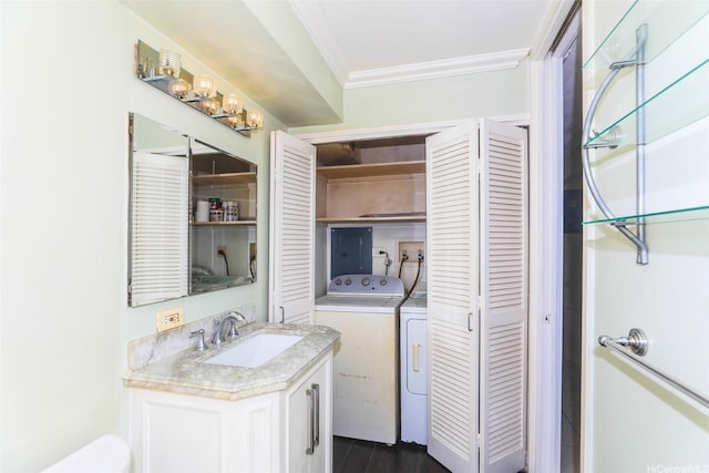 1717 Ala Wai Blvd Unit 303, Honolulu, HI 96815 - bathroom featuring washer and dryer, vanity, a closet, crown molding, and electric panel