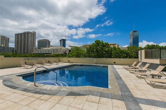1717 Ala Wai Blvd Unit 303, Honolulu, HI 96815 - community pool with a patio and a city view