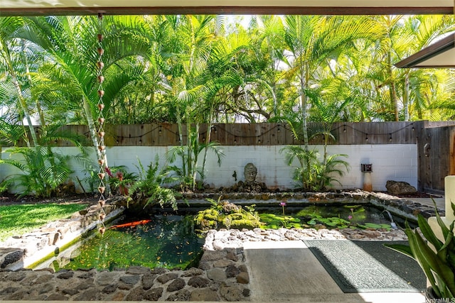 47 Kaapuni Dr, Kailua, HI 96734 - fenced backyard with a garden pond