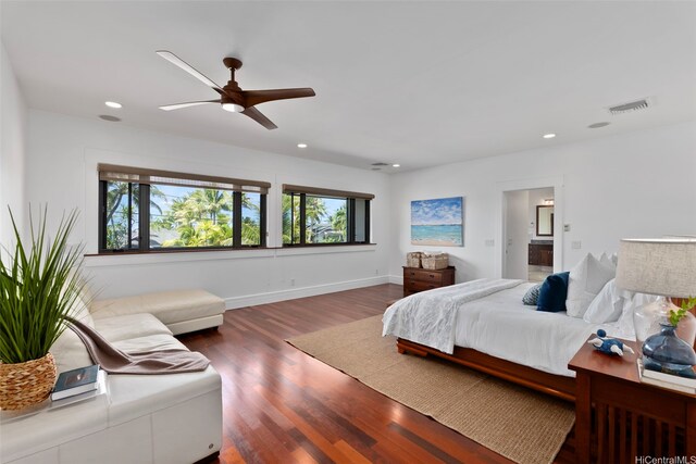 47 Kaapuni Dr, Kailua, HI 96734 - bedroom featuring wood finished floors, recessed lighting, a ceiling fan, baseboards, and ensuite bath