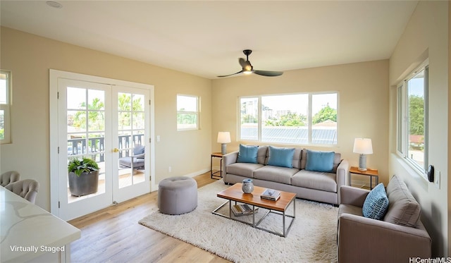 84-160 Jade St, Waianae, HI 96792 - living room featuring wood finished floors, a ceiling fan, french doors, and baseboards