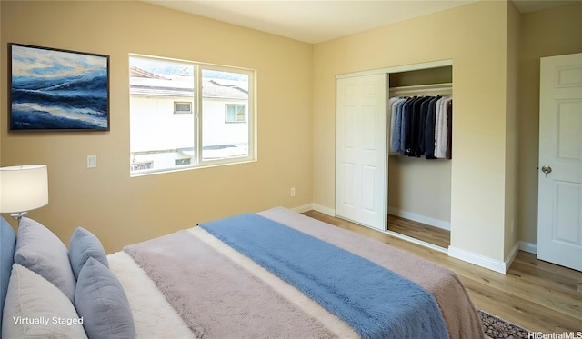 84-160 Jade St, Waianae, HI 96792 - bedroom with wood finished floors, baseboards, and a closet