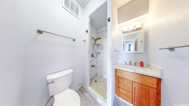 1096 S Beretania St Unit 301, Honolulu, HI 96814 - full bath featuring toilet, a shower stall, vanity, and wood finished floors