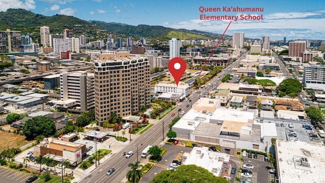 1096 S Beretania St Unit 301, Honolulu, HI 96814 - aerial view of property and surrounding area featuring nearby urban area and mountains