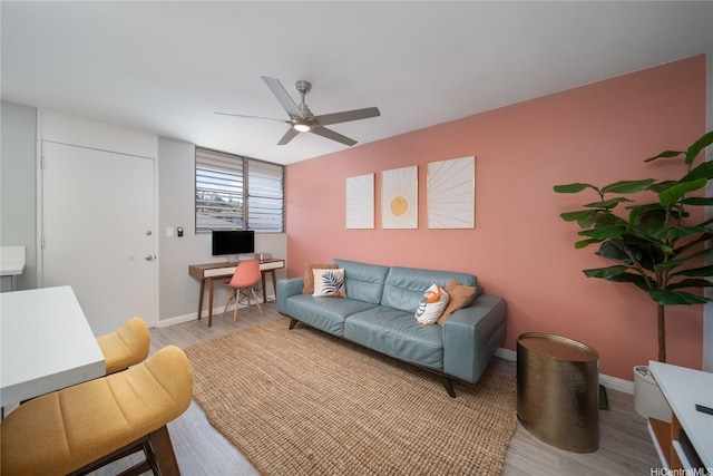 1401 Lusitana St Unit 504, Honolulu, HI 96813 - living room featuring ceiling fan, light wood-type flooring, baseboards, and an office area