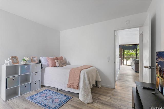 84-707 Kiana Pl Unit 107B, Waianae, HI 96792 - bedroom featuring wood finished floors and baseboards