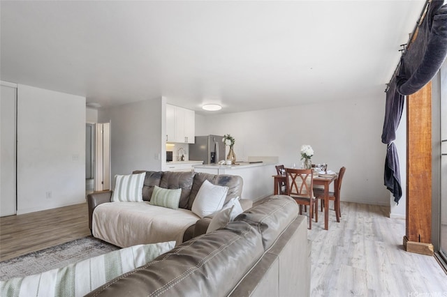 84-707 Kiana Pl Unit 107B, Waianae, HI 96792 - living room featuring light wood finished floors