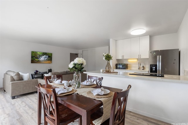 84-707 Kiana Pl Unit 107B, Waianae, HI 96792 - dining area featuring light wood-type flooring