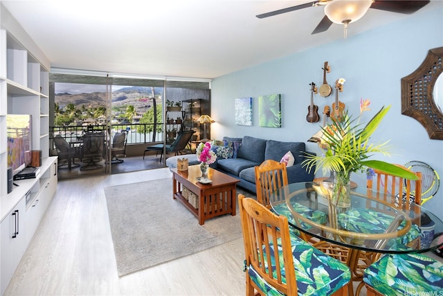 500 Lunalilo Home Rd Unit 22B, Honolulu, HI 96825 - living room with wood finished floors and ceiling fan