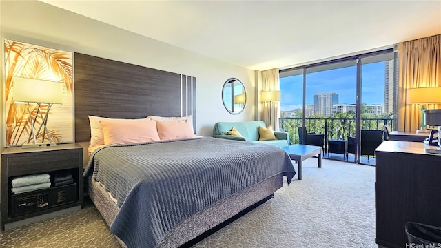 1850 Ala Moana Blvd Unit 222, Honolulu, HI 96815 - bedroom with expansive windows, carpet floors, and a view of city
