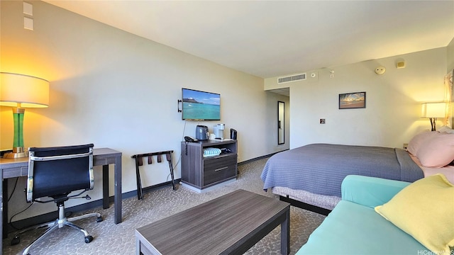 1850 Ala Moana Blvd Unit 222, Honolulu, HI 96815 - carpeted bedroom with baseboards and a desk
