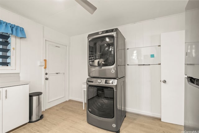 1614 Hoolulu Rd, Wahiawa, HI 96786 - laundry room with stacked washer / drying machine and light wood-style flooring