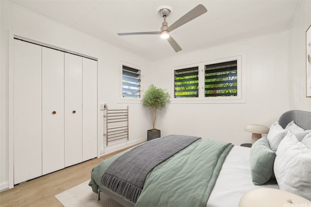 1614 Hoolulu Rd, Wahiawa, HI 96786 - bedroom with light wood finished floors, a closet, and ceiling fan