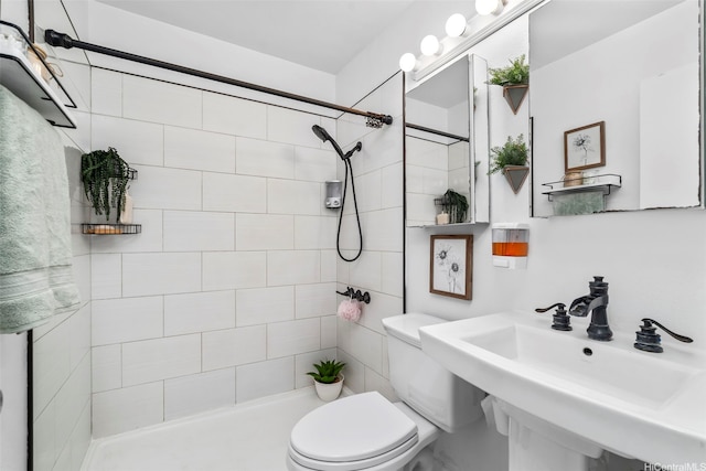 68-077 Au St Unit 2D, Waialua, HI 96791 - full bathroom featuring a sink, toilet, and tiled shower