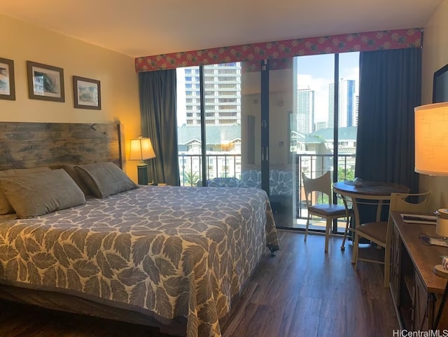 1850 Ala Moana Blvd Unit 223, Honolulu, HI 96815 - bedroom featuring wood finished floors, access to outside, and multiple windows