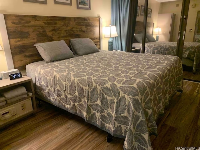 1850 Ala Moana Blvd Unit 223, Honolulu, HI 96815 - bedroom with wood finished floors
